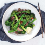 Beef and broccoli stir fry on a plate.